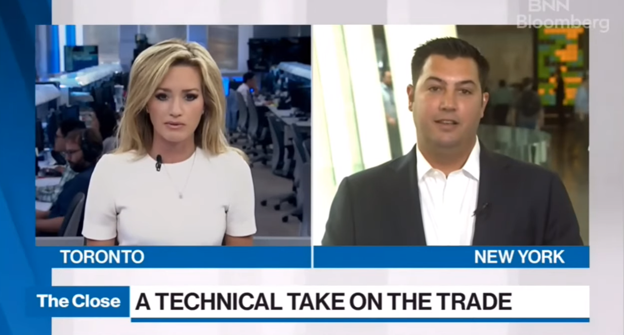 TV broadcast featuring two news anchors split-screen: a woman in Toronto newsroom, and JC Parets in New York. Caption reads, "A Technical Take on the Trade."