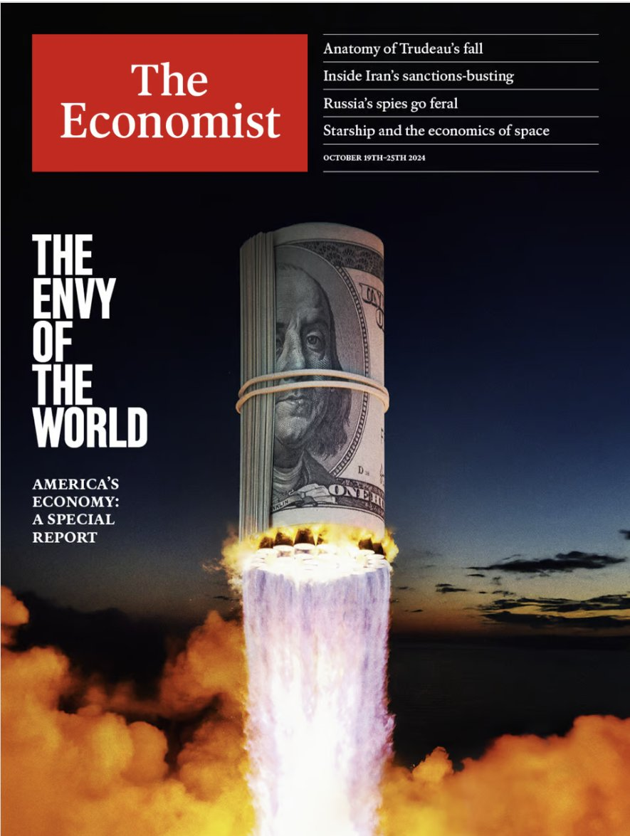 Cover of The Economist features a roll of US dollars launching like a rocket, symbolizing economic power. Headline reads "The Envy of the World."
