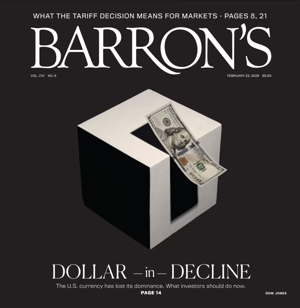 Cover of Barron's magazine featuring a dollar bill slipping off a large, three-dimensional black and white cube. Headline reads, 'Dollar in Decline.'